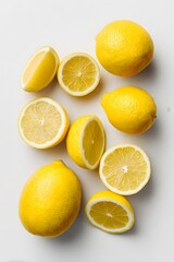 fresh lemons cut in half isolated on a white background