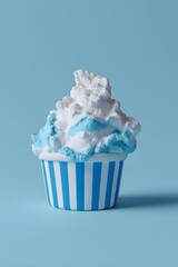 blue and white vanilla ice cream in a cup