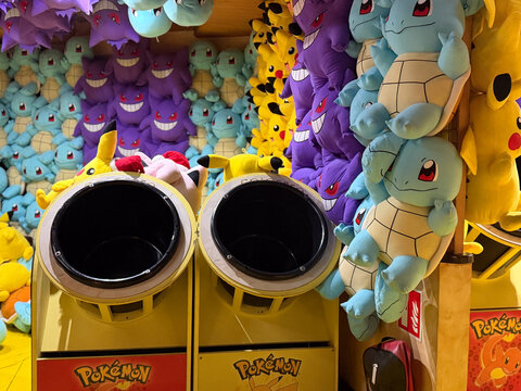 Colorful Pok&eacute;mon plush toy display with dispensers