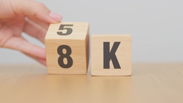 hand change wooden block from 5K to 8K, display resolution, Ultra High Definition, UHD, pixels, Technology, network, TV streaming, Social media and digital concepts