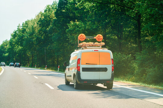 Traffic on forest road with service van