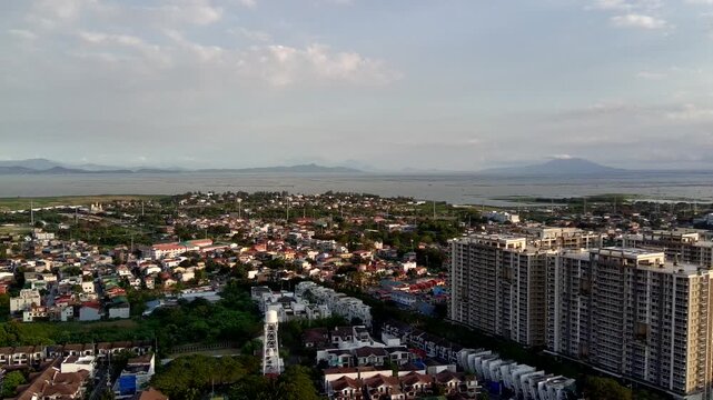 Boom Up of Landscape Aerial of Laguna Bay and Taguig City in Metro Manila Philippines