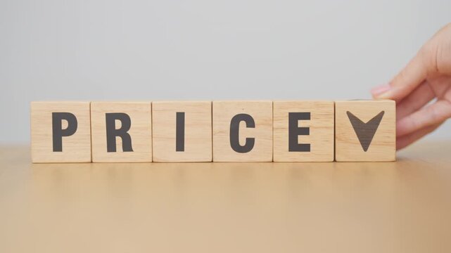 hand change wooden block with PRICE text to UP and Down arrow icon. Sale marketing, Price decrease and Increase Financial, money Value, discount, consumption, investment and purchases concept