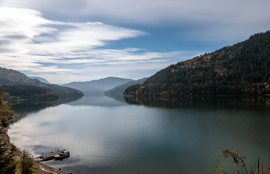 Peaceful Autumn Landscape Of Lake Izvorul Muntelui In Romania