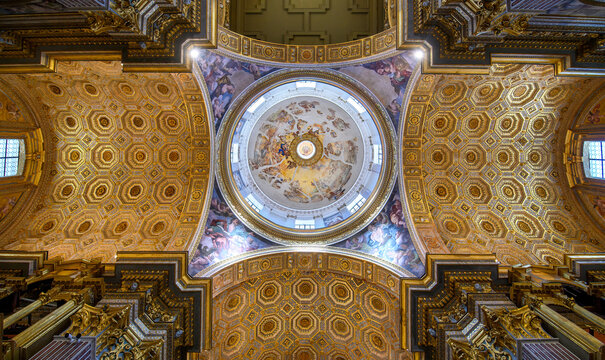 Naples, Italy. Girolamini Church (Chiesa dei Girolamini), featuring a spectacular golden coffered ceiling and marble columns.
