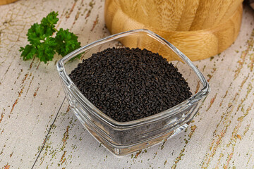 Black dry Nigella seeds in the bowl