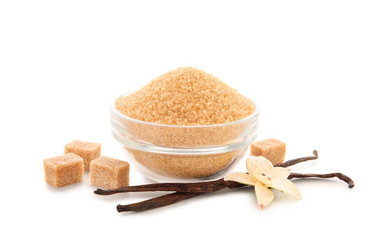 Bowl of sweet vanilla sugar on white background