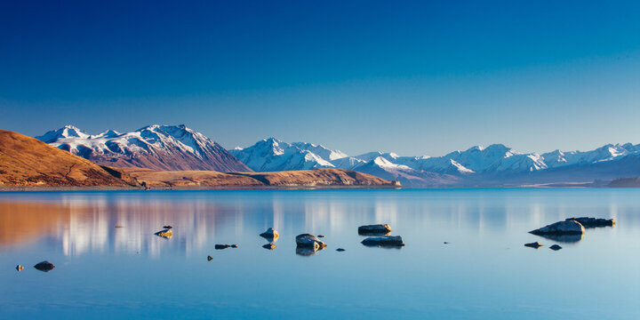 Majestic Lake Tekapo at sunset on a cool spring evening in New Zealand