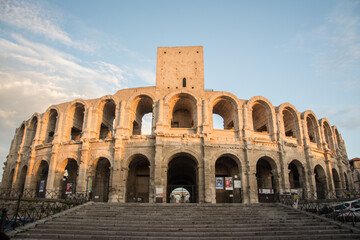 Fototapeta premium The Arena of Verona, an ancient Roman amphitheater, bathed in warm evening light during sunset. Italy. 