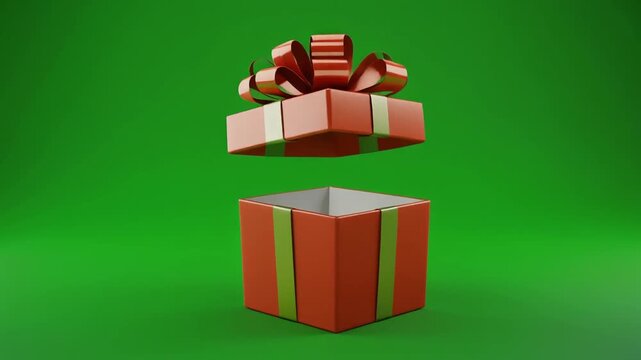 Red gift box with ribbon opening on green background.