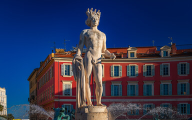 Fototapeta premium Famous fountain du Soleil with the statue of Apollo, Place Massena, Nice, France