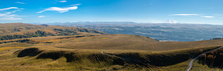 Panoramic view of Elbrus mount and the Main Caucasian Range in autumn