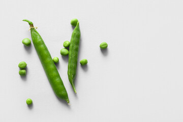 Green peas on light background