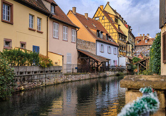 Festive decorations on half timbered houses, Colmar Christmas Market in France