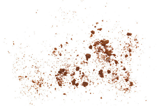 Pile cocoa biscuits crumbs, cookie pieces flying isolated on white, clipping path