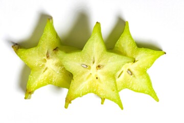 star fruit or carambola slices isolated on white background