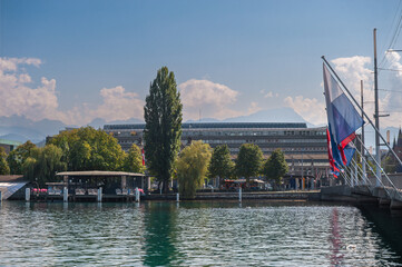 Lucerne, a compact Swiss city known for its well-preserved medieval architecture, is located amidst the snow-capped mountains of Lake Lucerne.
