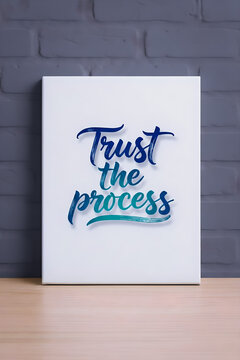 Motivation wordings on the board that says as trust the process
