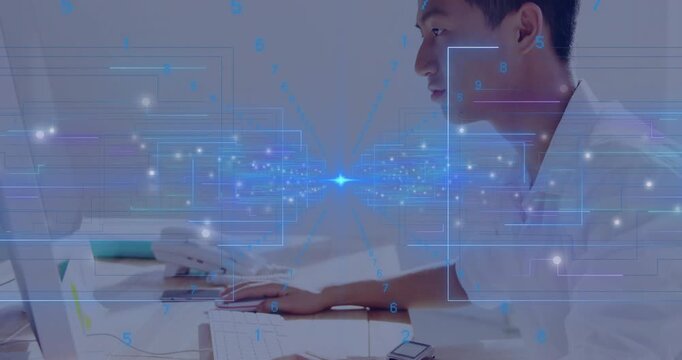 Man moving mouse and typing on keyboard when data graphics animating analytics dashboard