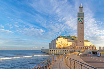 The Hassan II Mosque facing the Atlantic Ocean in the light of dawn, Casablanca, Morocco © dancar