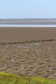 View across the National park of Vadehavet to Romo island at low tide from the causeway. Wadden Sea National Park, Southern Jutland, Denmark in the summer.