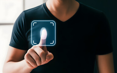 Man in black tshirt interacting with virtual fingerprint scanner interface on finger  security and technology concept