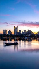 Fototapeta premium City Skyline at Sunset with Boat.