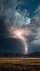 Fototapeta premium A dramatic lightning strike illuminates dark clouds over a mountain landscape, showcasing the power and beauty of nature's storms.