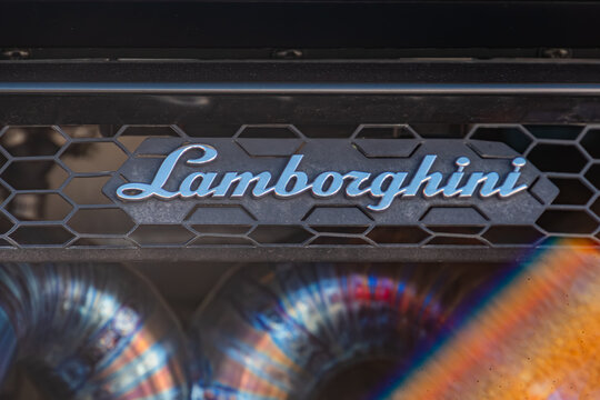 Close-up image of Lamborghini grille, featuring Lamborghini emblem on honeycomb metal background, with potential cooling system elements visible Angled lighting c - Kyiv, Ukraine - September 21, 2025