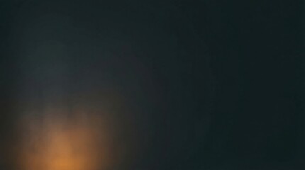 Fototapeta premium dark moody background with warm glowing light and smoky atmospheric effect