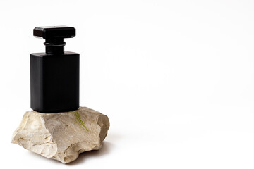 Black man perfume bottle close up. Male fragrance concept