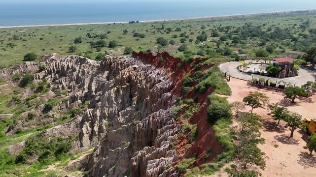 high-angle aerial perspective of the Miradouro da Lua (Viewpoint of the Moon) in Angola, featuring iconic eroded rock formations and vibrant earth tones