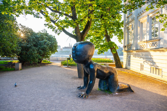 PRAGUE, CZECHIA - JUNE 18, 2025: The Babies at Kampa sculptures three large, faceless, crawling baby sculptures by Czech artist David Cerny, located in Kampa Park in Prague