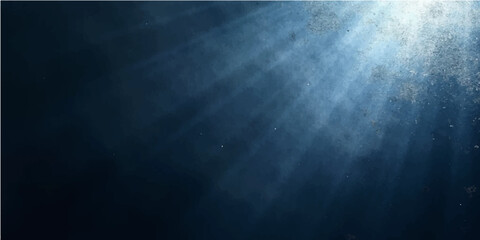Deep blue underwater scene background featuring shimmering light rays piercing through a dark misty sea with a motion pattern of smoke and clouds  © PS  GALLERY 