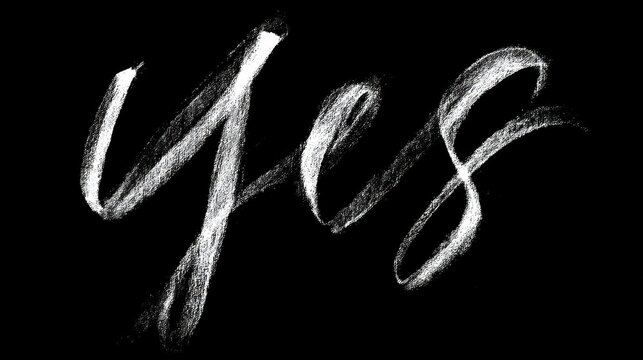 Black background with the word "yes" written in white chalk. the word is written in a cursive font with the letters "y" and "s" slightly larger than the rest of the word.