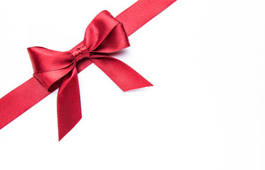 Red ribbon and bow creating a festive design