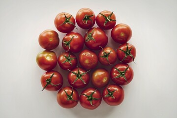 A photo of cherry tomatoes isolated on a white background
