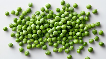 A pile of fresh green peas on a white surface.