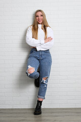 Portrait of beautiful blond young woman