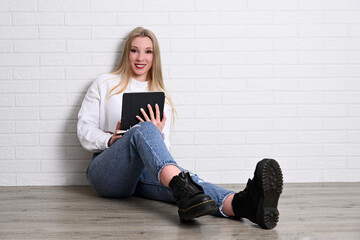 Portrait of young blond pretty woman