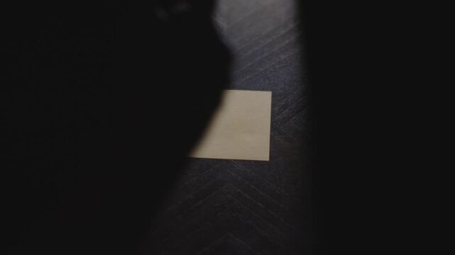 "Taurus" written on a Sticky Note with a sharpie and placed on a table under dramatic lighting