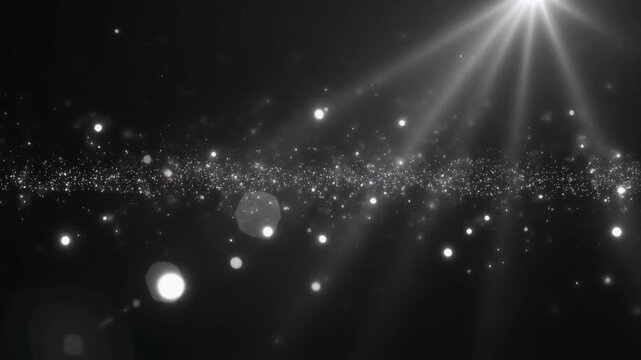 Sparkling dust particles float in a dark cosmic background with bright light rays and lens flares