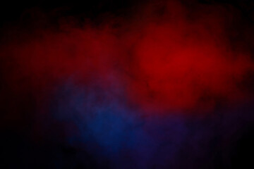 Obraz premium Orange and red steam on a black background.