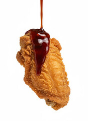 Golden Fried Chicken Drumstick Drizzled with Barbecue Sauce for a Tasty Fast Food Image Promotion