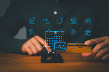 Man manages online payment and subscription with credit card and smartphone. Digital wallet icons for shopping, banking, and finance show a mobile lifestyle and calendar plan.