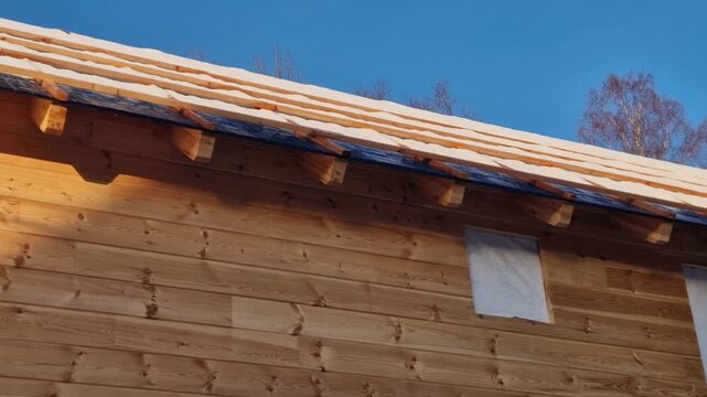 detail of timbered building, characteristic wooden beams and dovetail or similar carpentry joints.
Timbered houses are traditional wooden buildings that have calming cozy impression in over-technified