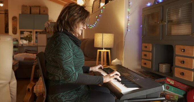 Melody Maker: A woman skillfully plays the keyboard, bathed in the soft glow of interior lighting, the scene evokes a sense of creative passion and personal retreat.