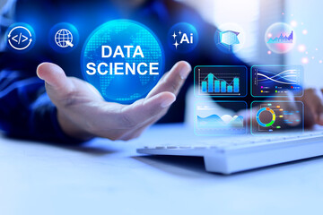 data science concept with programmer or data scientist working on desktop computer to holding data globe on his hand represent to collect and arrange summary conclusion for strategic process