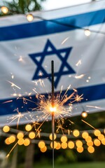 A sparkler in front of a flag