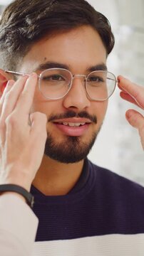 Help, optometry and man with glasses, eye test and wellness with appointment. Client, healthcare and person with frame, consultation and ophthalmology with spectacles, prescription and clear vision